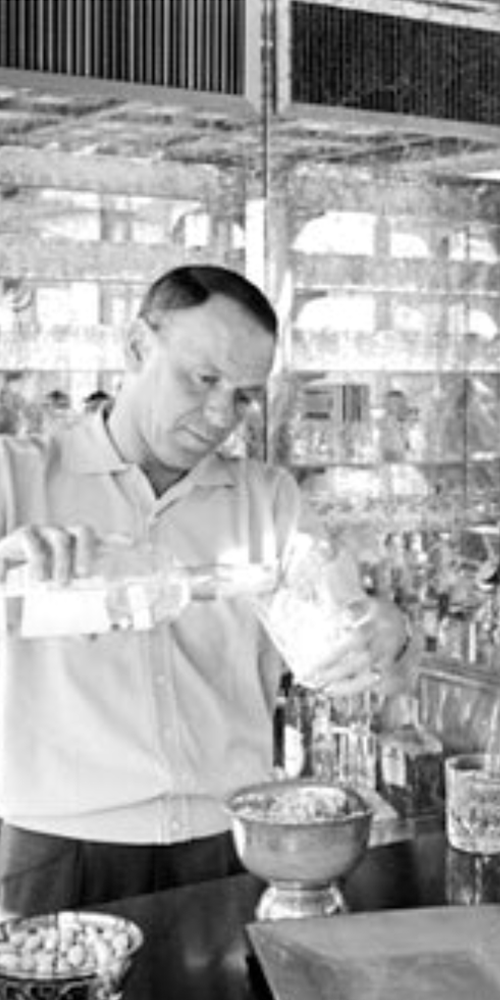 Frank Pouring a Drink