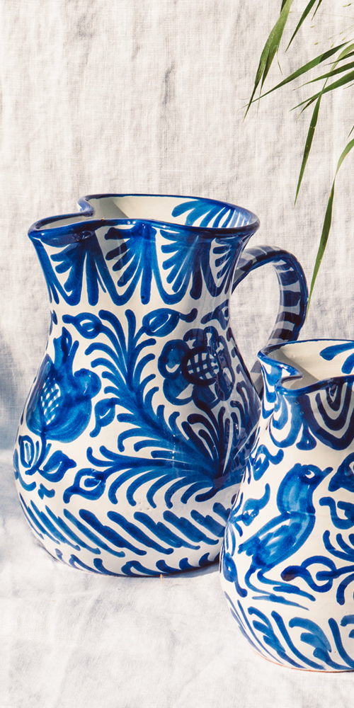 Medium pitcher with hand painted designs
